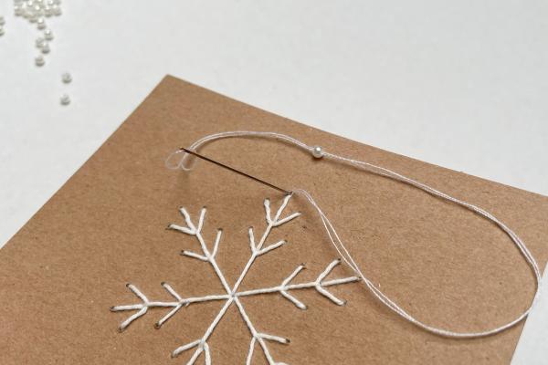 Jak jednoduše vyšít vločku na přání