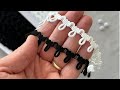 Prýmek s pružným očkem na knoflíky šíře 15 mm